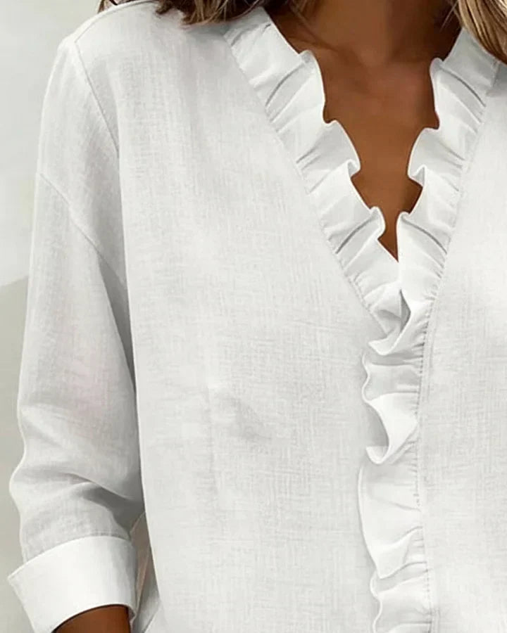 Claire™ | Blouse à encolure en V et volants délicats