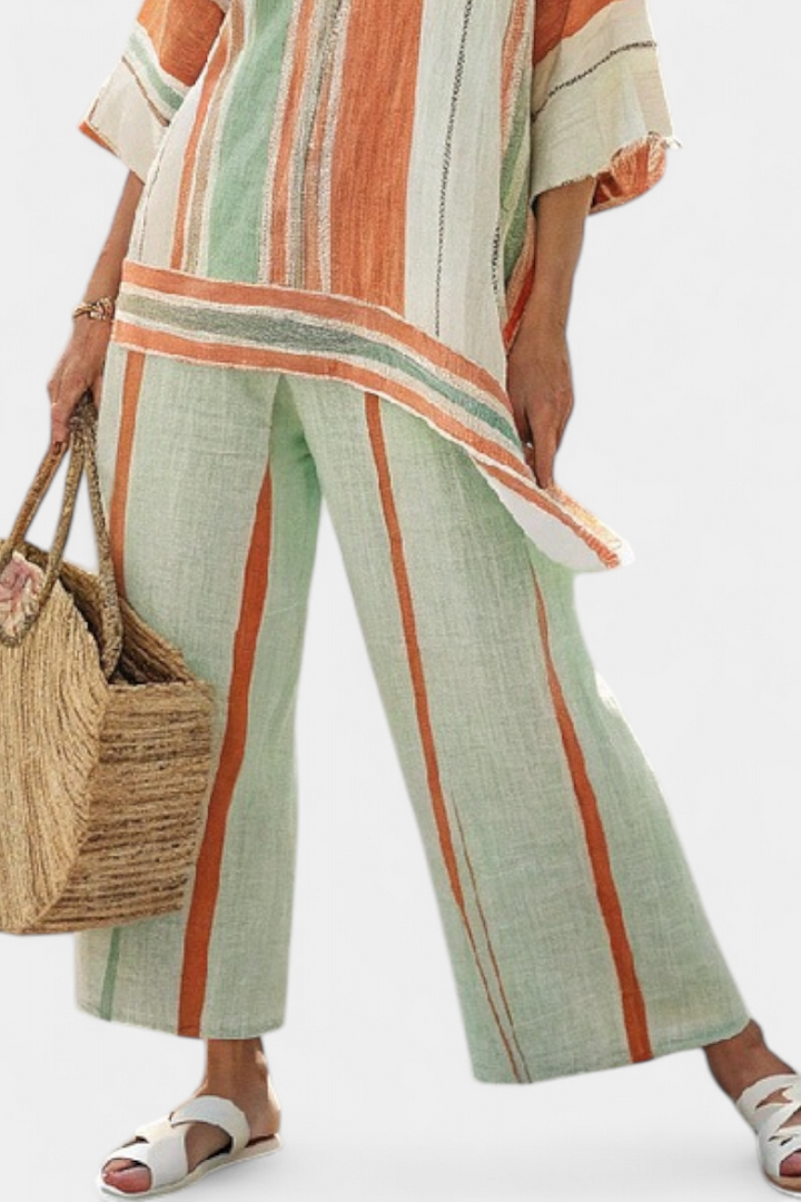 Elisabetta – top asimétrico elegante y pantalón de pierna ancha
